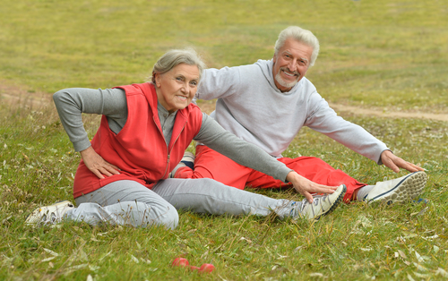 elderly couple streching