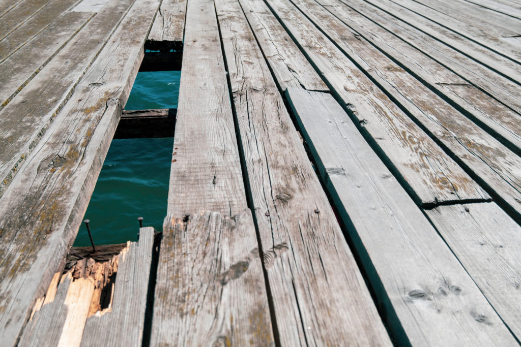 Common marina accidents resulting from poorly-maintained piers can result in serious injury.
