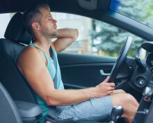 car accident victim holding neck